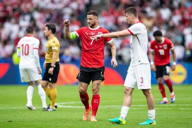 UEFA EURO 2024 Poland Austria 21 06 2024 Marko Arnautovic Austria, 7 , Pawel Dawidowicz Poland, 3 UEFA EURO 2024 Poland Austria Olympiastadion, Berlin 21 06 2024 Copyright: xBEAUTIFULxSPORTS Buriakovx