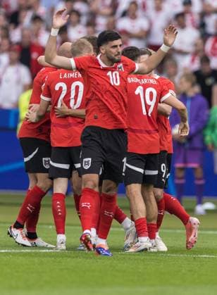 21st June 2024; Olympiastadion, Berlin, Germany; Euro 2024 Group D Football, Poland versus Austria; Grillitsch of Austria celebrates the goal for 0-1 by team mate Trauner with a powerful header in the 9th minute  ActionPlus12657898 FotoxOlimpik