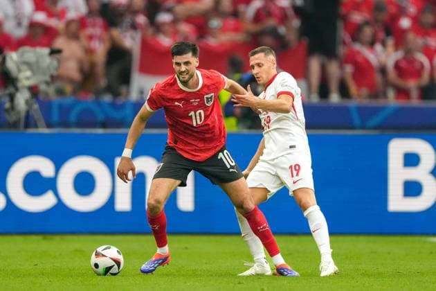 SOCCER - UEFA EURO, EM, Europameisterschaft,Fussball 2024 BERLIN,GERMANY,21.JUN.24 - UEFA EURO 2024, group stage, Austria vs Poland. Image shows Florian Grillitsch (AUT) and Przemyslaw Frankowski (POL).  GEPAxpictures xJohannesxFriedl