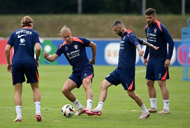 UEFA EURO, EM, Europameisterschaft,Fussball 2024: Croatia training session Domagoj Vida, Marcelo Brozovic and Bruno Petkovic of Croatia during the training session at Volksparkstadion in Neuruppin, Germany on June 21, 2024. MarkoxLukunic PIXSELL