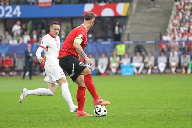 Berlin, Germany, 21 06 2024 Olympiastadion European Football Championship 2024, Group D, Poland Austria Marko Arnautovic 7, Austria has his foot on the ball, Piotr Zielinski 10, Poland has his eyes on it Copyright: xdtsxNachrichtenagenturx dts_41122