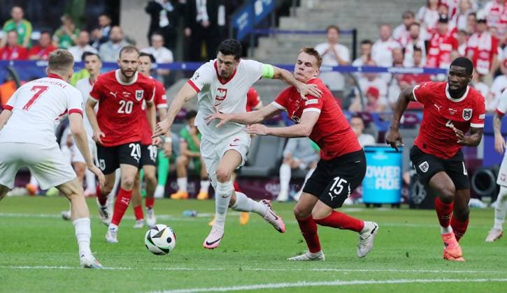 Konrad Laimer in a duel with Piotr Zielinski Sport Football Soccer European Championship Euro 2024 European Championship Men Season 2023 2024 21 06 2024 Poland POL vs Austria AUT in Berlin DFL regulations prohibit any use of photographs as image sequences and or quasi video