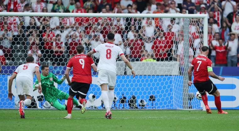 Marko Arnautovic shoots penalty kick against goalkeeper Wojciech Szczesny for 1 3 Sport Football Soccer European Championship Euro 2024 European Championship Men Season 2023 2024 21 06 2024 Poland POL vs Austria AUT in Berlin DFL regulations prohibit any use of photographs as image sequences and or quasi video