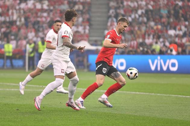 Berlin, Germany, 21 06 2024 Olympiastadion European Football Championship 2024, Group D, Poland Austria Nicola Zalewski 21, Poland national team and Stefan Posch 5, Austria national team , who has the ball, in a duel Copyright: xdtsxNachrichtenagenturx dts_41138