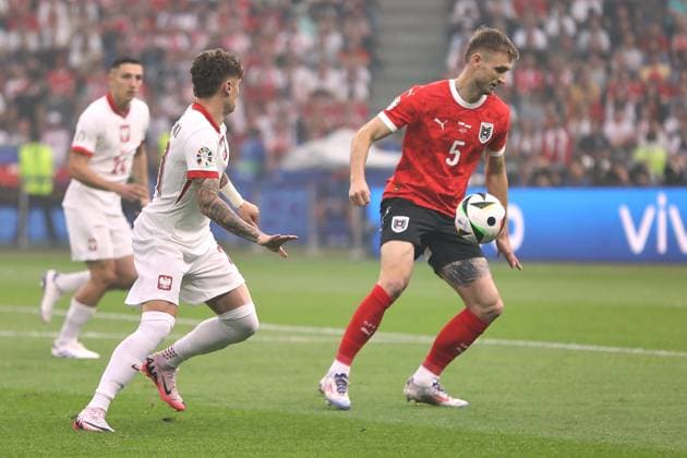 Berlin, Germany, 21 06 2024 Olympiastadion European Championship 2024 soccer, Group D, Poland Austria Nicola Zalewski 21, Poland national team and Stefan Posch 5, Austria national team in a duel Copyright: xdtsxNachrichtenagenturx dts_41139