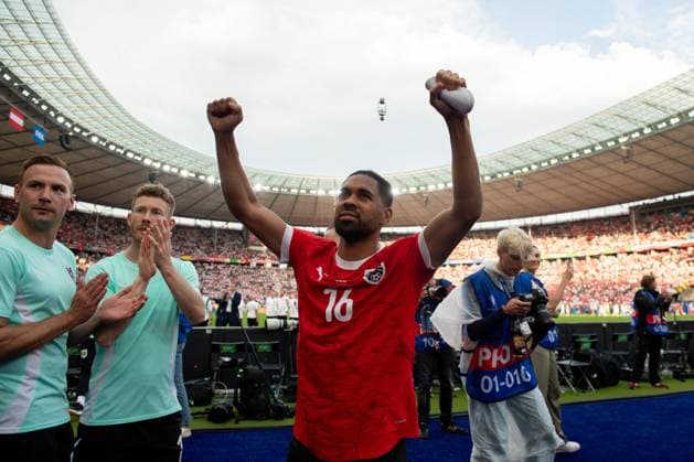BERLIN, GERMANY - JUNE 21: Phillipp Mwene of Austria celebrates winning the UEFA EURO, EM, Europameisterschaft,Fussball 2024 group stage match between Poland and Austria at Olympiastadion on June 21, 2024 in Berlin, Germany. Photo Sebastian Frej Poland v Austria Copyright: xx
