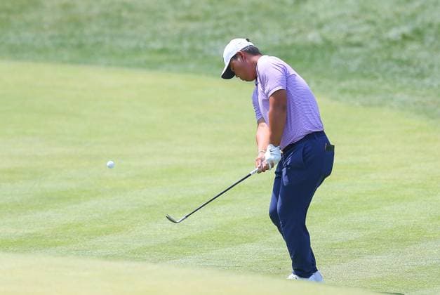 CROMWELL, CT - JUNE 21: Tom Kim of Republic of Korea putts onto the 15th green during the second round of the 2024 Travelers Championship on June 21, 2024, at TPC River Highlands in Cromwell, CT. (Photo by M. Anthony Nesmith Icon Sportswire) GOLF: JUN 21 PGA, Golf Herren Travelers Championship EDITORIAL USE ONLY Icon240621012024