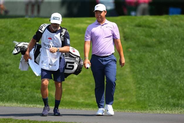 CROMWELL, CT - JUNE 21: Tom Kim of Republic of Korea walks to his shot on the 12th fairway during the second round of the 2024 Travelers Championship on June 21, 2024, at TPC River Highlands in Cromwell, CT. (Photo by M. Anthony Nesmith Icon Sportswire) GOLF: JUN 21 PGA, Golf Herren Travelers Championship EDITORIAL USE ONLY Icon240621162024
