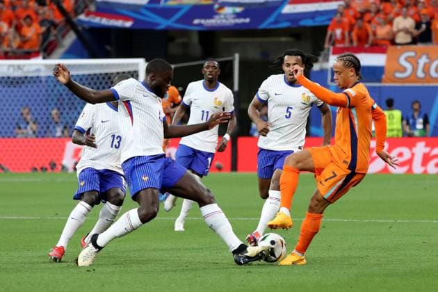 21 06 2024, xtgx, Football EM 2024, Netherlands France emspor, v l Dayot Upamecano France Xavi Simons Netherlands duel, action, action, battle for the ball DFL DFB REGULATIONS PROHIBIT ANY USE OF PHOTOGRAPHS as IMAGE SEQUENCES and or QUASI VIDEO Leipzig