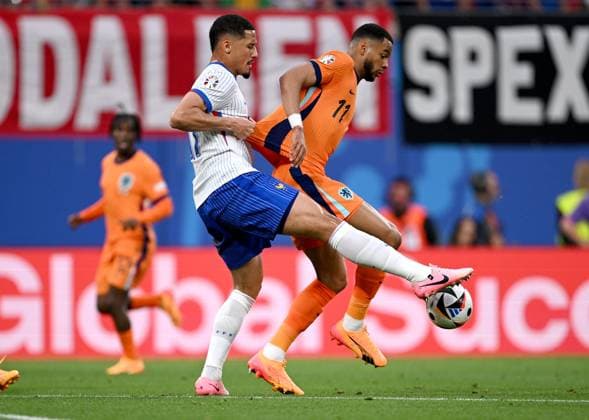 Football Euro 2024 Group D 21 06 2024 Netherlands France William Saliba left, France v Cody Gakpo right, Netherlands