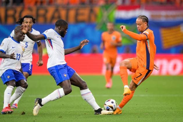 Soccer, UEFA EURO 2024, 20240621, Netherlands France In the picture Dayot UPAMECANO France, 4 and Xavi SIMONS Netherlands, 7 duel ball Leipzig Leipzig Stadium Saxony Germany Copyright: Passion2Press MarkusxFischerx