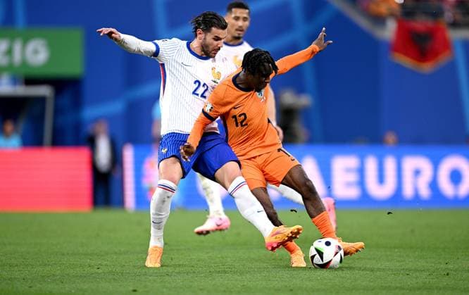 Football Euro 2024 Group D 21 06 2024 Netherlands France Theo Hernandez left, France v Jeremie Frimpong right, Netherlands
