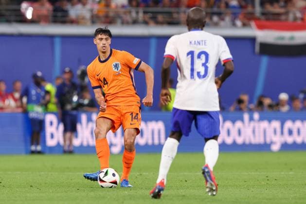 2024-06-21 Netherlands v France - Group D - UEFA EURO, EM, Europameisterschaft,Fussball 2024 LEIPZIG, GERMANY - JUNE 21: Tijjani Reijnders of the Netherlands and N Golo Kante of France during the Group D - UEFA EURO 2024 match between Netherlands and France at Red Bull Arena on June 21, 2024 in Leipzig, Germany. (Photo by Peter Lous BSR Agency) Leipzig Germany Content not available for redistribution in The Netherlands directly or indirectly through any third parties. Copyright: xBSRxAgencyx