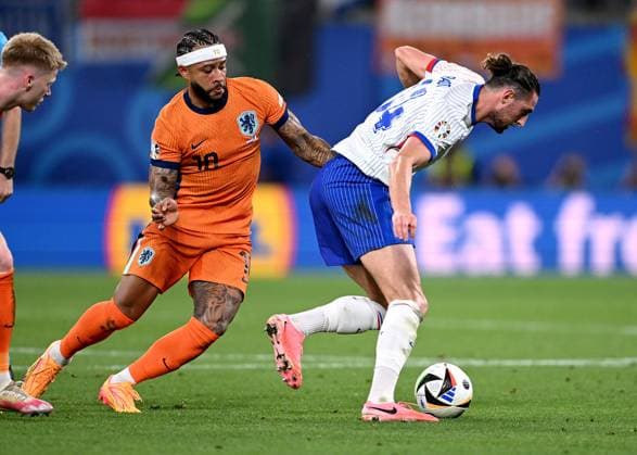 Football Euro 2024 Group D 21 06 2024 Netherlands France Memphis Depay left, Netherlands v Adrien Rabiot right, France