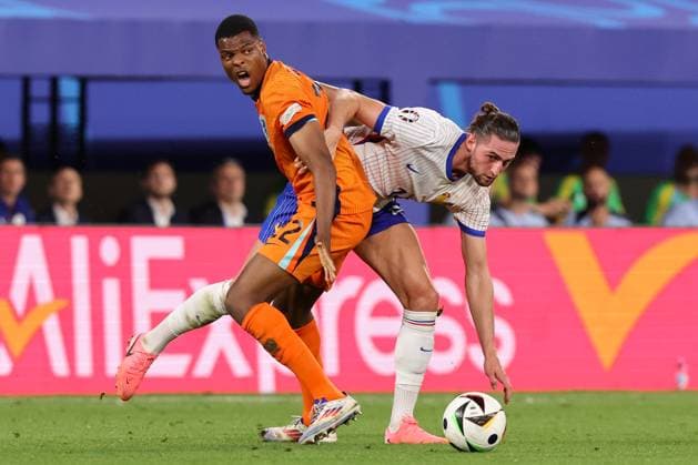 2024-06-21 Netherlands v France - Group D - UEFA EURO, EM, Europameisterschaft,Fussball 2024 LEIPZIG, GERMANY - JUNE 21: Denzel Dumfries of the Netherlands battles for the ball with Theo Hernandez of France during the Group D - UEFA EURO 2024 match between Netherlands and France at Red Bull Arena on June 21, 2024 in Leipzig, Germany. (Photo by Peter Lous BSR Agency) Leipzig Germany Content not available for redistribution in The Netherlands directly or indirectly through any third parties. Copyright: xBSRxAgencyx