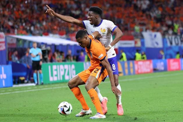 Soccer UEFA EURO 2024 Group Stage 2 Matchday Netherlands France on 21 06 2024 at Leipzig Stadium in Leipzig Denzel Dumfries Netherlands , front Aurelien Tchouameni France , back xMSx