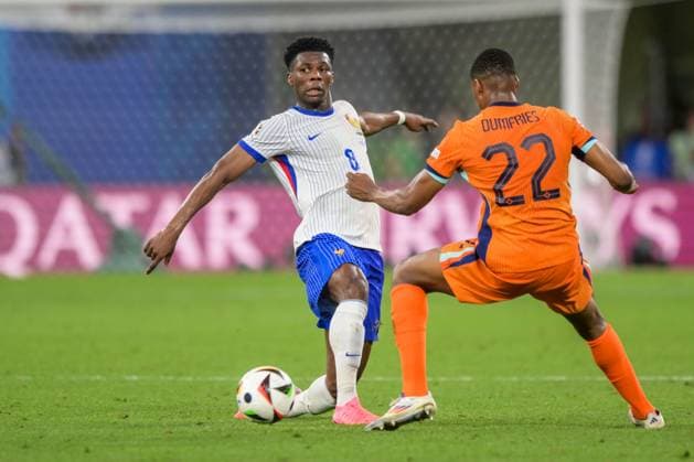 Soccer, UEFA EURO 2024, 20240621, Netherlands France In the picture Aurelien TCHOUAMENI France, 8 and Denzel DUMFRIES Netherlands, 22 duel ball Leipzig Leipzig Stadium Saxony Germany Copyright: Passion2Press MarkusxFischerx