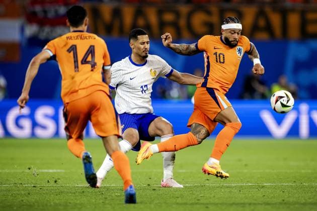LEIPZIG - William Saliba of France and Memphis Depay of Holland (l-r) during the UEFA EURO, EM, Europameisterschaft,Fussball 2024 group D match between the Netherlands and France at the Leipzig Stadium on June 21, 2024 in Leipzig, Germany. ANP KOEN VAN WEEL UEFA EURO 2024 2024 xVIxANPxSportx xxANPxIVx 501707341 originalFilename: 501707341.jpg