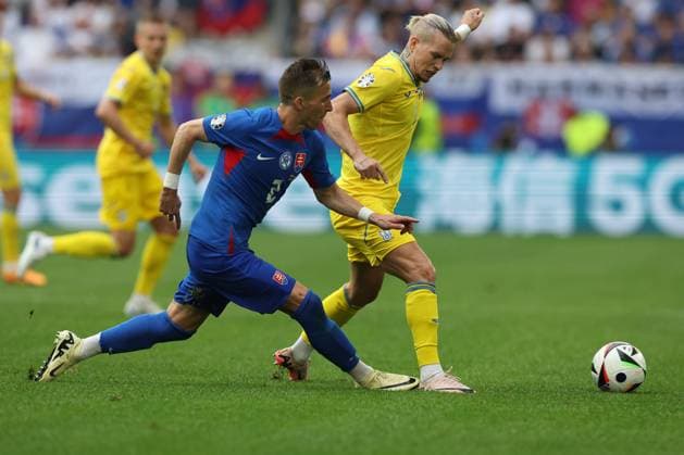 Dusseldorf, Germany 21.06.2024: Peter Pekarik of Slovakia , Mykhailo Mudryk of Ukraine during the UEFA EURO, EM, Europameisterschaft,Fussball 2024 group stage E football match between Slovakia vs Ukraine at Dusseldorf Arena in Dusseldorf  Copyright: xx xx IPA_Agency_IPA47359827