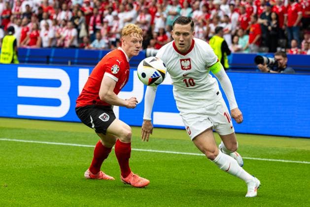 Poland v Austria - UEFA EURO, EM, Europameisterschaft,Fussball 2024 Nicolas Seiwald, Piotr Zielinski are playing during the UEFA Euro 2024 Group D match between Poland v Austria, at the Olympiastadion in Berlin,Germany, on June 21, 2024. Berlin Germany  Copyright: xAndrzejxIwanczukx originalFilename:iwanczuk-polandva240621_npWhI.jpg