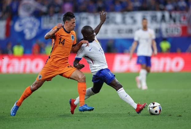 (240622) -- LEIPZIG, June 22, 2024 -- N Golo Kante (R) of France vies with Tijjani Reijnders of the Netherlands during the UEFA EURO, EM, Europameisterschaft,Fussball 2024 Group D match between France and the Netherlands in Leipzig, Germany on June 21, 2024. ) (SP)GERMANY-LEIPZIG-FOOTBALL-EURO 2024-FRANCE VS THE NETHERLANDS BaixXuefei 
