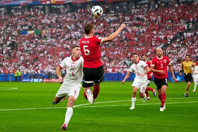Jakub Piotrowski Poland national team Euro 2024, 06 ,Stefan Posch Austria national team Euro 2024, 05 , GER, UEFA Euro 2024, mens football, UEFA EURO 2024 matchday 2, group D, Poland vs Oesterrech, Poland vs Austria, 21 06 2024 GER, UEFA Euro 2024, mens football, UEFA EURO 2024 matchday 2, group D, Poland vs Oesterrech, Poland vs Austria, 21 06 2024 Berlin Copyright: xEibner-Pressefotox xClaudiusxRauchx EP_CRH
