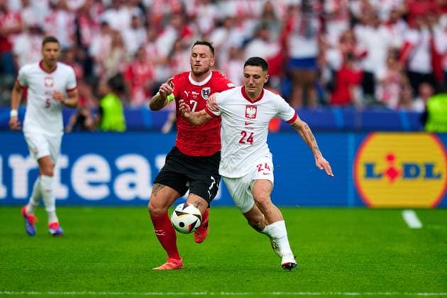 Marko Arnautovic Austria national team Euro 2024, 07 , Bartosz Slisz Poland national team Euro 2024, 24 , GER, UEFA Euro 2024, mens football, UEFA EURO 2024 matchday 2, group D, Poland vs Oesterrech, Poland vs Austria, 21 06 2024 GER, UEFA Euro 2024, mens football, UEFA EURO 2024 matchday 2, group D, Poland vs Oesterrech, Poland vs Austria, 21 06 2024 Berlin Copyright: xEibner-Pressefotox xClaudiusxRauchx EP_CRH