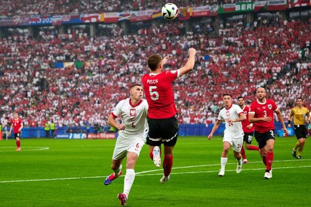 Jakub Piotrowski Poland national team Euro 2024, 06 ,Stefan Posch Austria national team Euro 2024, 05 , GER, UEFA Euro 2024, mens football, UEFA EURO 2024 matchday 2, group D, Poland vs Oesterrech, Poland vs Austria, 21 06 2024 GER, UEFA Euro 2024, mens football, UEFA EURO 2024 matchday 2, group D, Poland vs Oesterrech, Poland vs Austria, 21 06 2024 Berlin Copyright: xEibner-Pressefotox xClaudiusxRauchx EP_CRH
