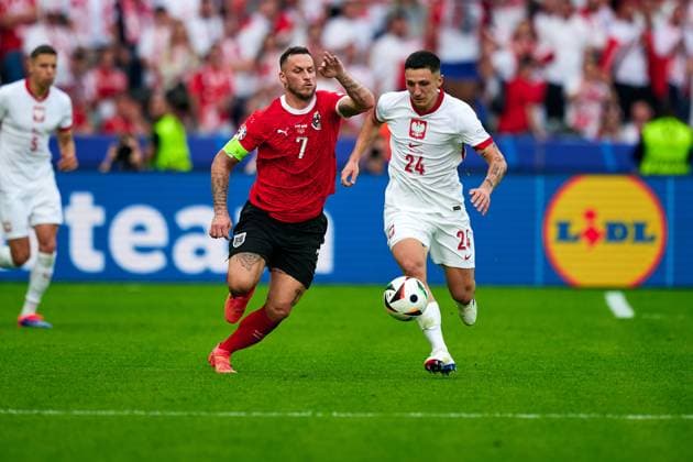 Marko Arnautovic Austria national team Euro 2024, 07 , Bartosz Slisz Poland national team Euro 2024, 24 , GER, UEFA Euro 2024, mens football, UEFA EURO 2024 matchday 2, group D, Poland vs Oesterrech, Poland vs Austria, 21 06 2024 GER, UEFA Euro 2024, mens football, UEFA EURO 2024 matchday 2, group D, Poland vs Oesterrech, Poland vs Austria, 21 06 2024 Berlin Copyright: xEibner-Pressefotox xClaudiusxRauchx EP_CRH