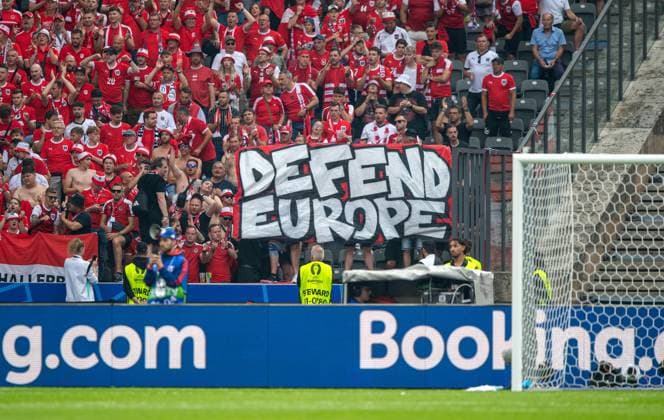 Football, Men, Season 2023 24, Euro 2024 Group D 2 Matchday in Berlin, Poland Austria, Fans of Austria with banner Defend Europe, 21 06 2024, Copyright: xSebastianxRäppold MatthiasxKochx