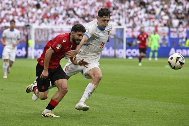 L-R Zuriko Davitashvili (GEO) and Ladislav Krejci II (CZE) in action during the Group F match of the European Football Championship: Georgia vs Czechia, in Hamburg, Germany, on June 22, 2024. (CTKxPhoto VitxSimanek) CTKPhotoP2024062203679  CTKPhotoP2024062203679