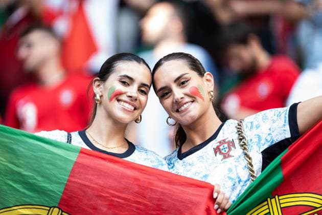 GER, Euro 2024, Group F, Turkey TUR vs Portugal PRT , 22 06 2024, BVB Stadion Dortmund Signal Iduna Park, Dortmund, GER, Euro 2024, Group F, Turkey TUR vs Portugal PRT , In the picture fans of Portugal POR laughing, having fun, showing the flag, gestures, facial expressions, emotions nordphotoxGmbHxx xChristianxSchulze nph000300