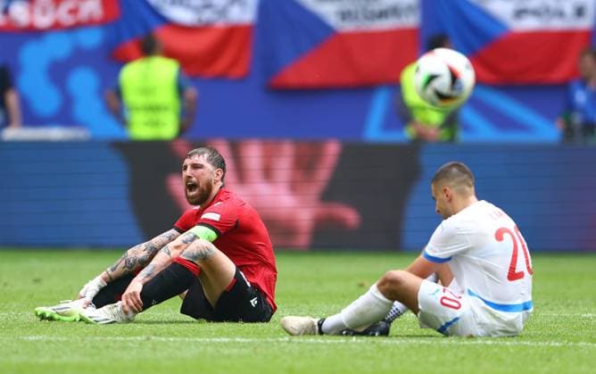 Guram Kashia of Georgia and Ondrej Lingr of Czech Republic show a look of dejection at full time Georgia v Czechia, UEFA European Championship, EM, Europameisterschaft 2024, Group F, Football, Volksparkstadion, Hamburg, Germany, 22 Jun 2024 EDITORIAL USE ONLY No use with unauthorised audio, video, data, fixture lists, club league logos or live services. Online in-match use limited to 120 images, no video emulation. No use in betting, games or single club league player publications.  Copyright: xKieranxMcManus Shutterstockx 14548025cr
