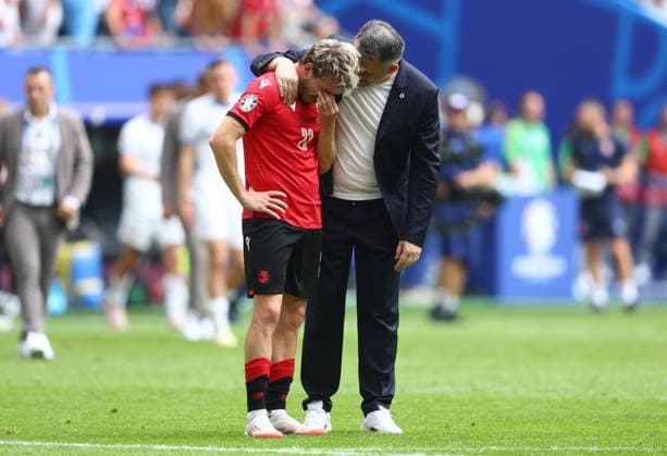Georgia manager Willy Sagnol comforts Saba Lobzhanidze of Georgia after missing a game winning chance at full time Georgia v Czechia, UEFA European Championship, EM, Europameisterschaft 2024, Group F, Football, Volksparkstadion, Hamburg, Germany, 22 Jun 2024 EDITORIAL USE ONLY No use with unauthorised audio, video, data, fixture lists, club league logos or live services. Online in-match use limited to 120 images, no video emulation. No use in betting, games or single club league player publications.  Copyright: xKieranxMcManus Shutterstockx 14548025ct