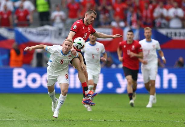Michal Sadilek of Czech Republic and Giorgi Chakvetadze of Georgia compete for the ball Georgia v Czechia, UEFA European Championship, EM, Europameisterschaft 2024, Group F, Football, Volksparkstadion, Hamburg, Germany, 22 Jun 2024 EDITORIAL USE ONLY No use with unauthorised audio, video, data, fixture lists, club league logos or live services. Online in-match use limited to 120 images, no video emulation. No use in betting, games or single club league player publications.  Copyright: xKieranxMcManus Shutterstockx 14548025dz
