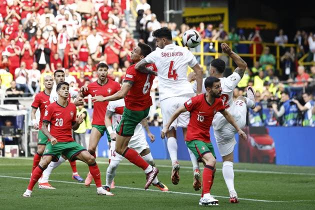 DORTMUND, Signal Iduna Park, 22-06-2024 , European Football Championship Euro2024, Group stage match no.23 between Turkiye and Portugal. (L-R) Portugal player Joao Palhinha, Turkiye player Samet Akaydin Turkiye - Portugal (Euro2024)  x25565057x Copyright: