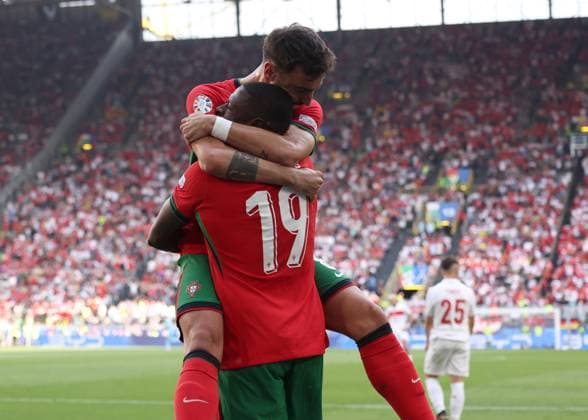 Dortmund, Germany, 22nd June 2024. Nuno Mendes of Portugal celebrates the first goal with Bruno Fernandes of Portugal during the UEFA European Championships match at BVB Stadion, Dortmund. Picture credit should read: David Klein Sportimage EDITORIAL USE ONLY. No use with unauthorised audio, video, data, fixture lists, club league logos or live services. Online in-match use limited to 120 images, no video emulation. No use in betting, games or single club league player publications. SPI-3202-0031