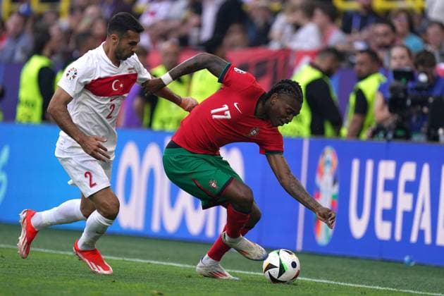 2024-06-22 Turkiye v Portugal - Group F - UEFA EURO, EM, Europameisterschaft,Fussball 2024 DORTMUND, GERMANY - JUNE 22: Rafael Leao of Portugal battles for the ball with Mehmet Zeki Celik of Turkiye during the Group F - UEFA EURO 2024 match between Turkiye and Portugal at BVB Stadion Dortmund on June 22, 2024 in Dortmund, Germany. (Photo by Joris Verwijst BSR Agency) Dortmund Germany Content not available for redistribution in The Netherlands directly or indirectly through any third parties. Copyright: xBSRxAgencyx