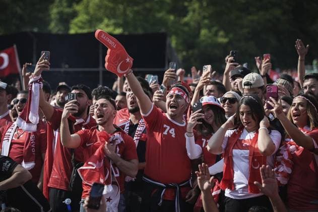 Fans European Championship match Turkey vs Portugal FOR EDITORIAL PURPOSES ONLY p Turkish fans celebrate in the fan zone at Westalenpark in Dortumd, on Saturday, June 22, 2024 during the European Championship match between Turkey and Portugal Germany North Rhine Westphalia Dortmund Copyright SocratesxTassos Copyright: SocratesxTassos doc7vzd50tz6ogp8n87f0q ,EDITORIAL USE ONLY Copyright: SocratesxTassos