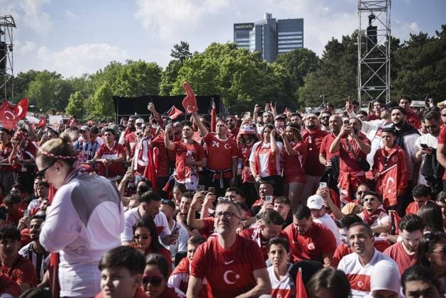 Fans European Championship match Turkey vs Portugal FOR EDITORIAL PURPOSES ONLY p Turkish fans celebrate in the fan zone at Westalenpark in Dortumd, on Saturday, June 22, 2024 during the European Championship match between Turkey and Portugal Germany North Rhine Westphalia Dortmund Copyright SocratesxTassos Copyright: SocratesxTassos doc7vzd50hz9ia1l8zu3mqj ,EDITORIAL USE ONLY Copyright: SocratesxTassos