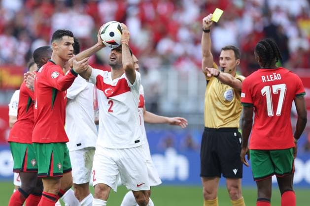 Zeki Ã?elik of Turkey reacts to being cautioned by referee Felix Zwayer Turkiye v Portugal, UEFA European Championship, EM, Europameisterschaft 2024, Group F, Football, BVB Stadion, Dortmund, Germany, 22 Jun 2024 EDITORIAL USE ONLY No use with unauthorised audio, video, data, fixture lists, club league logos or live services. Online in-match use limited to 120 images, no video emulation. No use in betting, games or single club league player publications.  Copyright: xPaulxCurrie Shutterstockx 14548034cz