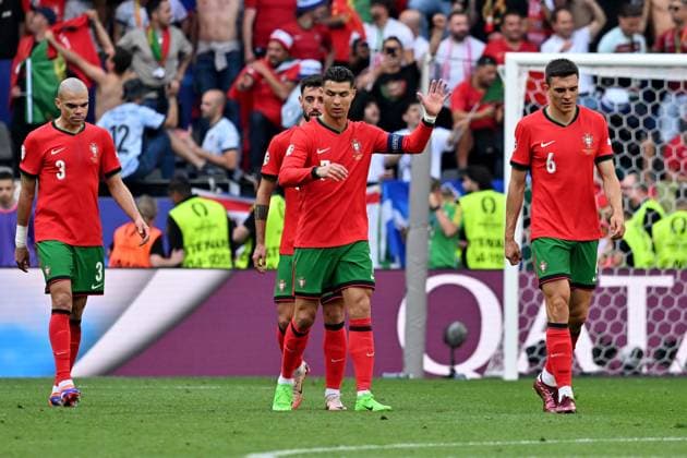 22 06 2024, xsltx, Football EM 2024, Turkey Portugal emspor, v l Goal celebration after the own goal to 0 2 by Samet Akaydin Turkey Turkey Cristiano Ronaldo Portugal DFL DFB REGULATIONS PROHIBIT ANY USE OF PHOTOGRAPHS as IMAGE SEQUENCES and or QUASI VIDEO Dortmund