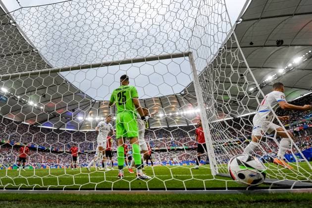 Patrik Schick (CZE; right) celebrates his goal (1:1) during the Group F match of the European Football Championship: Georgia vs Czechia, in Hamburg, Germany, on June 22, 2024. On the left side is seen goalkeeper Giorgi Mamardashvili (GEO). (CTKxPhoto VitxSimanek) CTKPhotoP2024062205256  CTKPhotoP2024062205256