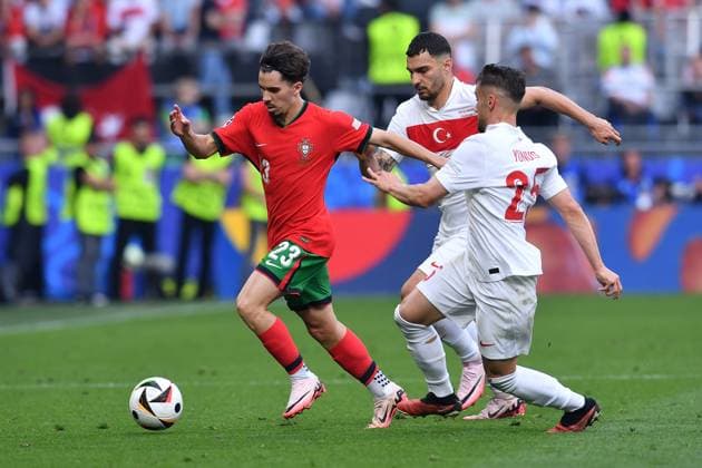Soccer UEFA EURO 2024 Group Stage 2 Matchday Turkey Portugal on 22 06 2024 at BVB Stadion Dortmund in Dortmund Vitinha Portugal , left Kaan Ayhan Turkey , center Yunus Akgün Turkey , right xRx