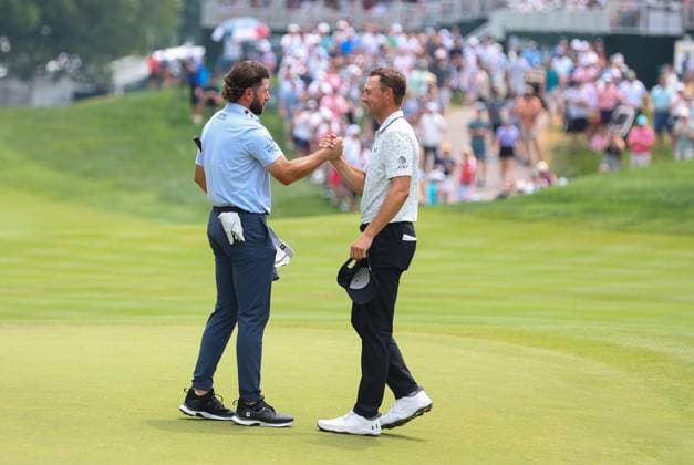 CROMWELL, CT - JUNE 22: Cameron Young of United States shakes hands with Jordan Spieth of United States on the 18th green after shooting 59 during the third round of the 2024 Travelers Championship on June 22, 2024, at TPC River Highlands in Cromwell, CT. (Photo by M. Anthony Nesmith Icon Sportswire) GOLF: JUN 22 PGA, Golf Herren Travelers Championship EDITORIAL USE ONLY Icon240622042024
