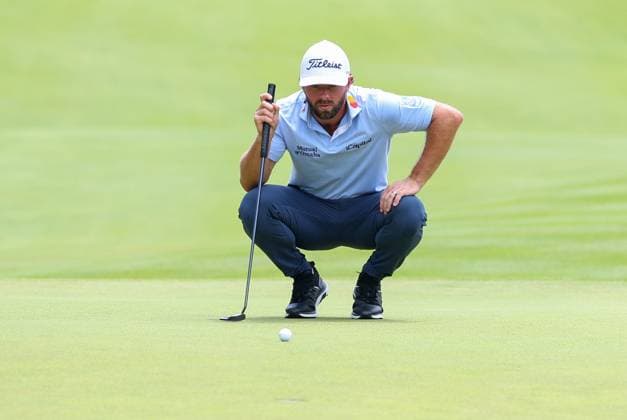CROMWELL, CT - JUNE 22: Cameron Young of United States studies his putt on the 18th green during the third round of the 2024 Travelers Championship on June 22, 2024, at TPC River Highlands in Cromwell, CT. (Photo by M. Anthony Nesmith Icon Sportswire) GOLF: JUN 22 PGA, Golf Herren Travelers Championship EDITORIAL USE ONLY Icon240622282024