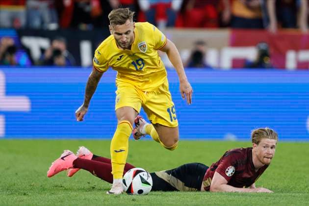Belgium v Romania: Group E - UEFA EURO, EM, Europameisterschaft,Fussball 2024 Denis Dragus of Romania Kevin De Bruyne of Belgium challenge during the UEFA EURO 2024 group stage match between Belgium and Romania at Cologne Stadium on June 22, 2024 in Cologne, Germany. Cologne Cologne Stadium Germany Germany Copyright: xRichardxSellers Sportsphoto APLx 14042147