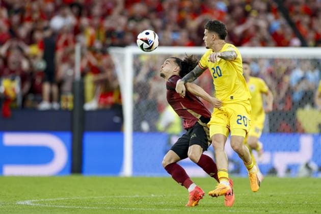 COLOGNE, RheinEnergieStadium , 22-06-2024 , European Football Championship Euro2024, Group stage match no.22 between Belgium and Romania. Belgium player Arthur Theate and Romania player Dennis Man Belgium - Romania (Euro2024)  x25568067x Copyright:
