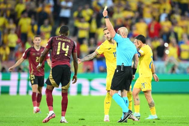 Belgium v Romania Group E - UEFA EURO, EM, Europameisterschaft,Fussball 2024 COLOGNE, GERMANY - JUNE 22 : Lukebakio Dodi forward of Belgium is shown a yellow card by referee Szymon Marciniak (POL) during the UEFA EURO 2024 European Football Championship tournament group E stage match between Belgium and Romania at Cologne Stadium on June 22, 2024 in Cologne, Germany, 22 06 2024 Cologne Germany  Copyright: xVincentxKalutx