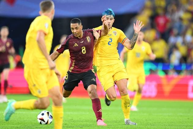 Belgium v Romania Group E - UEFA EURO, EM, Europameisterschaft,Fussball 2024 COLOGNE, GERMANY - JUNE 22 : Tielemans Youri midfielder of Belgium is fighting for the ball with Andrei Ratiu defender of Romania during the UEFA EURO 2024 European Football Championship tournament group E stage match between Belgium and Romania at Cologne Stadium on June 22, 2024 in Cologne, Germany, 22 06 2024 Cologne Germany  Copyright: xVincentxKalutx